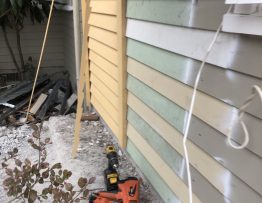 Weatherboard replacement after chimney removal with staggered joints